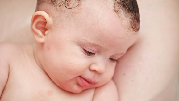 Baby Girl with Mother in Bathtub