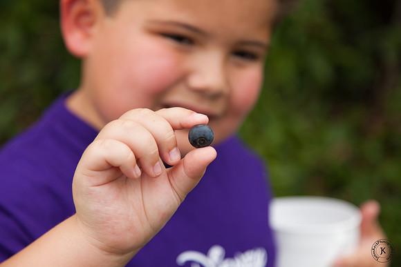 William Holding up Blueberry