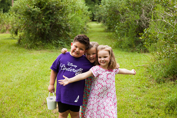 Cousins Picking Blueberries