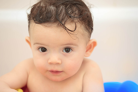 Portrait of Baby Boy in Bathtub