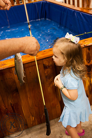 Excited Little Girl Caught a Fish