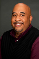 Professional Salesman LinkedIn Headshot - man in sweater vest