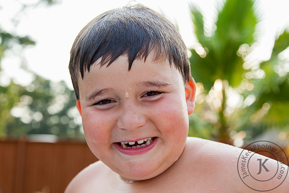 Portrait of Smiling Boy in Swimming Pool