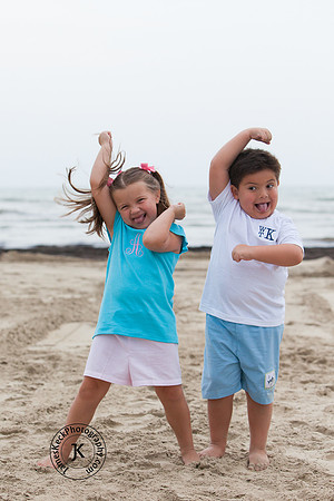 Brother and Sister Acting Silly on Beach