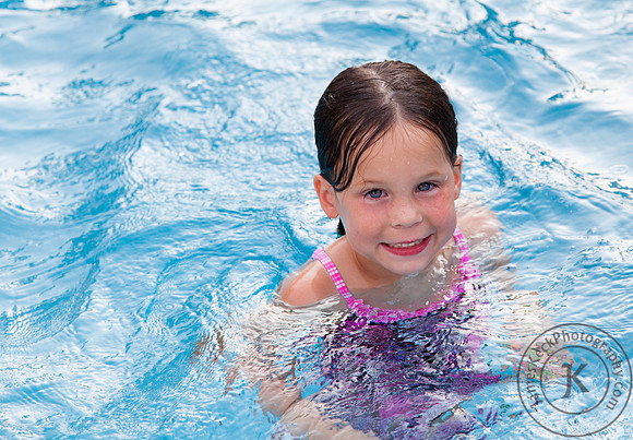 Portrait of Smiling Girl in Swimming Pool
