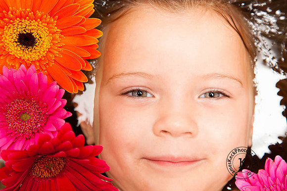 Portrait of Girl with Gerbera Daisies in Bathtub