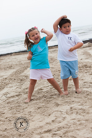 Brother and Sister Acting Silly on Beach