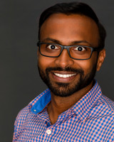Professional Engineer LinkedIn Headshot - man in checkered shirt and glasses