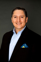 Houston executive LinkedIn headshot — man in blue suit