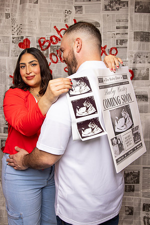 Couple with Baby Announcement