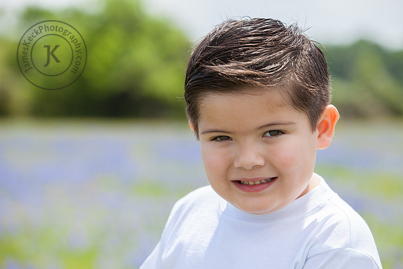 Portrait of Boy Smiling with Bluebonnets
