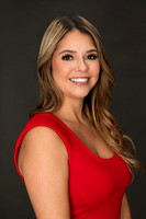 Professional Executive Assistant LinkedIn Headshot - woman in red dress
