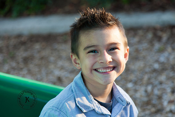 Portrait of Smiling Boy on Slide