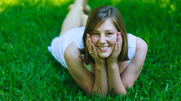 Girl Senior Portrait in the Grass