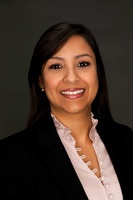Professional Engineer LinkedIn Headshot - woman in suit and pink blouse