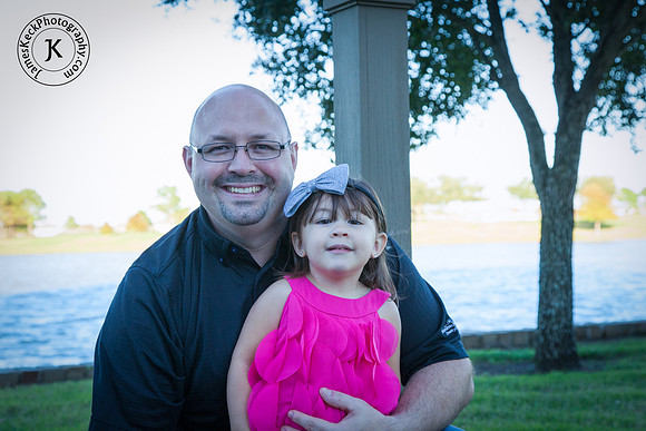 Portait of Father and Daughter Next to Lake in Bridgeland