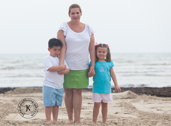 Portrait of Mother, Son, and Daughter on the Beach