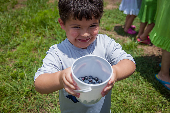 Photo of William with Blueberries