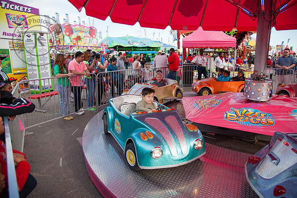 William Riding Carnival Racecar at Houston Rodeo