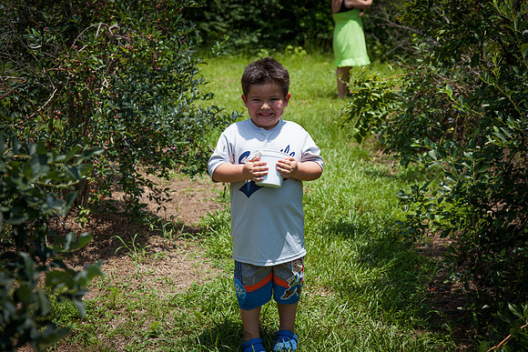 William with a Big Smile and Blueberries