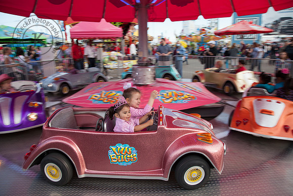 Audrey Riding Carnival Racecar at Houston Rodeo 3